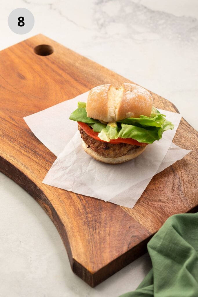 Air fryer turkey burger on a wooden board