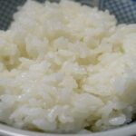 White and fluffy cooked rice in a bowl