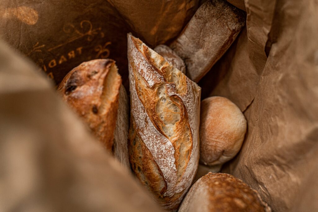 Pile of bread on a brown paper bag