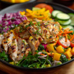 Chicken protein salad on a black bowl