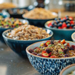 Various trail mix bowls lined up on a countertop