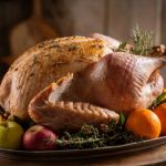 A carved turkey on a platter.