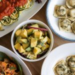 Different types of meal like xucchini Noodles with marinara, gnocchi with pesto cream, and mango and avocado salad