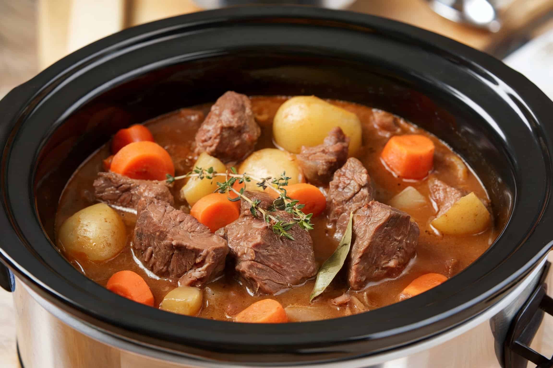 A crockpot filled with a beef stew