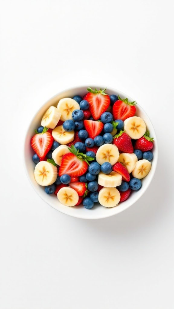A bowl filled with red strawberries, blue blueberries, and sliced bananas.